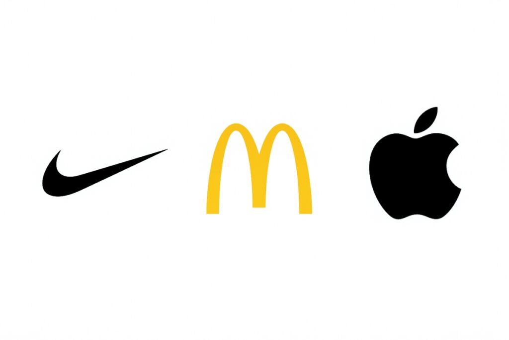 Examples of simple logos like Apple, Nike, and McDonald’s showing the power of minimalism.