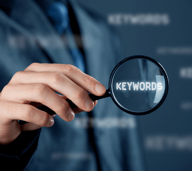 magnifying glass highlighting the word keywords