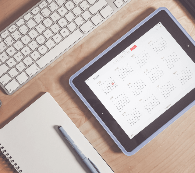 top down view of a table with a yearly calendar on it